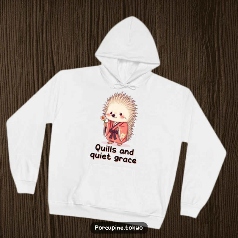 Funny porcupine wearing a kimono, offering a delicate flower, a cozy and humorous hoodie design.