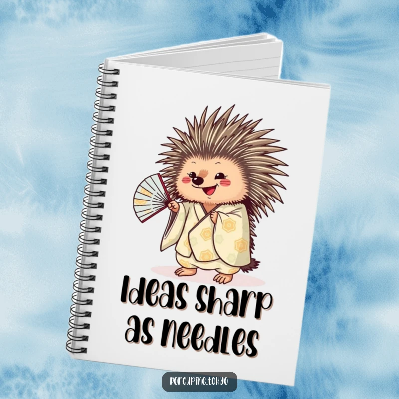 Funny porcupine in a patterned kimono, holding and shaking a fan, a humorous notebook for creative minds.